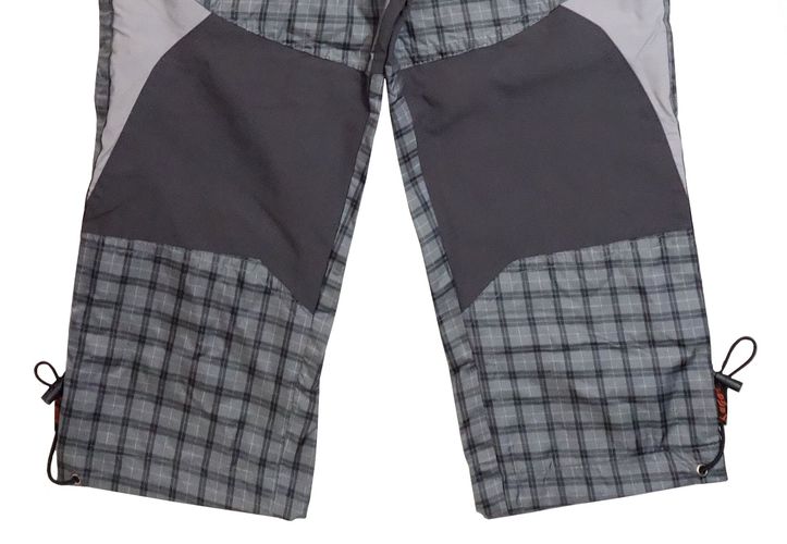 Šusťákové chlapecké kalhoty Kugo